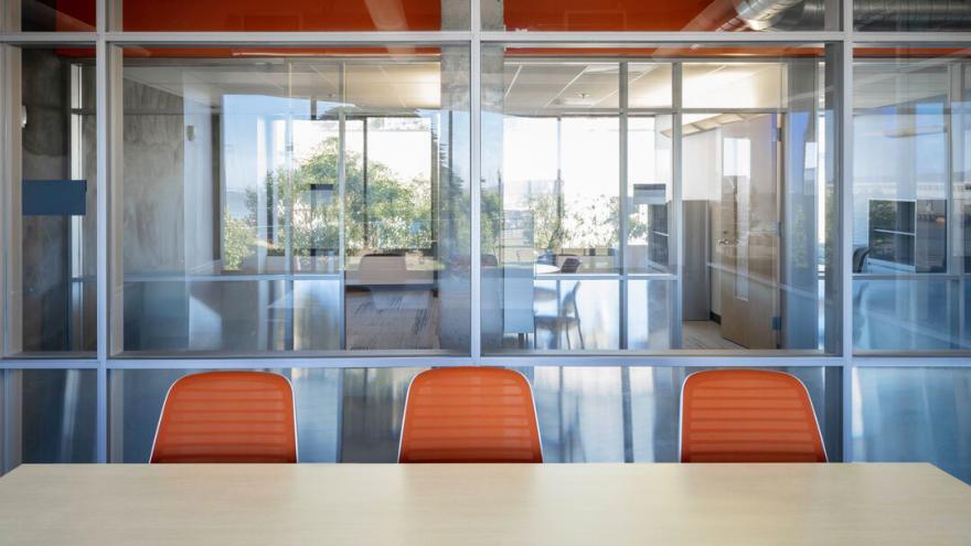 Empty conference room with orange chairs