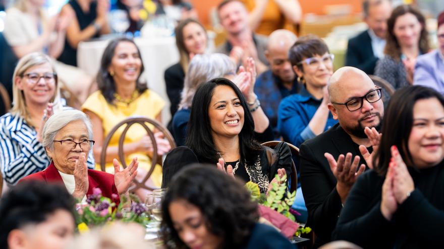 People in audience applauding