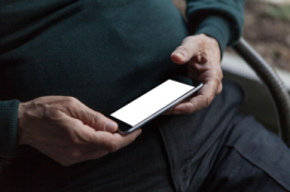 Person holding phone in hand