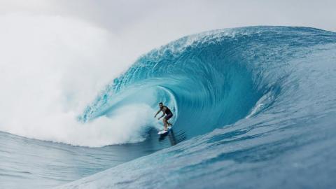 Person surfing a wave