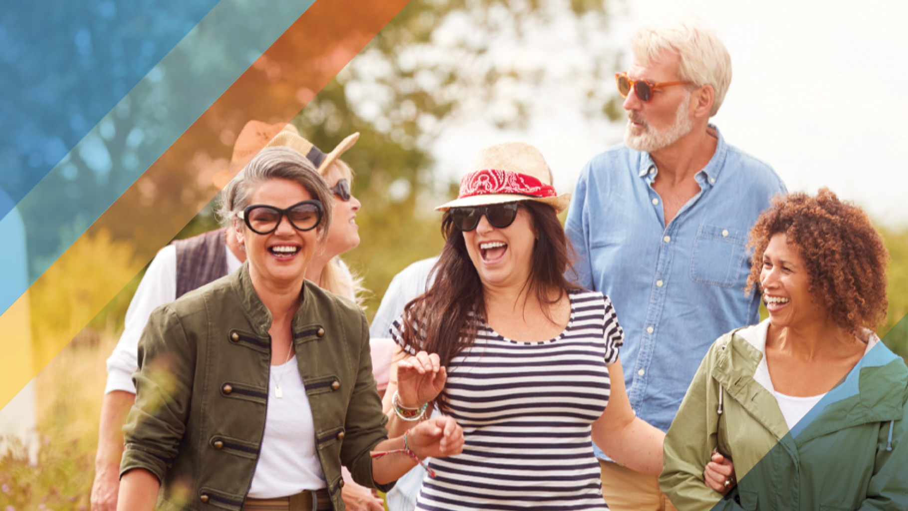 Four people walking and talking happily