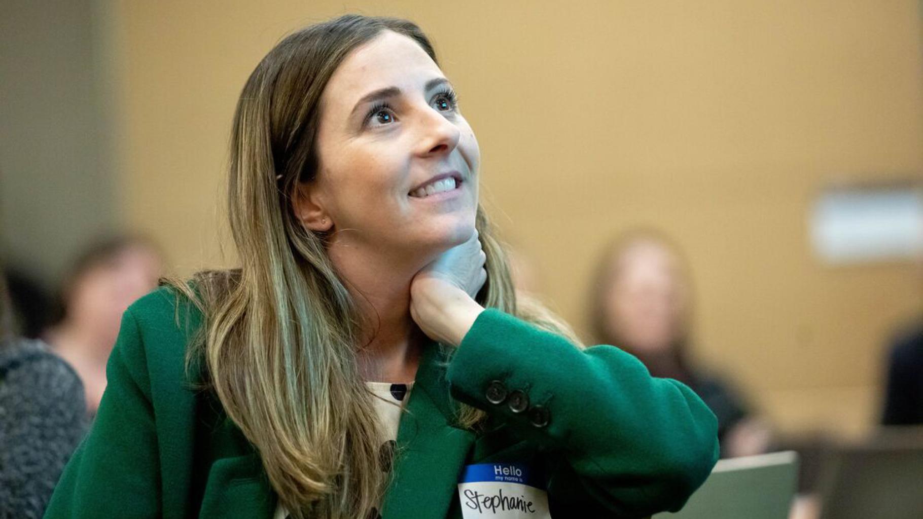 UCSF employee listens to staff engagement presentation