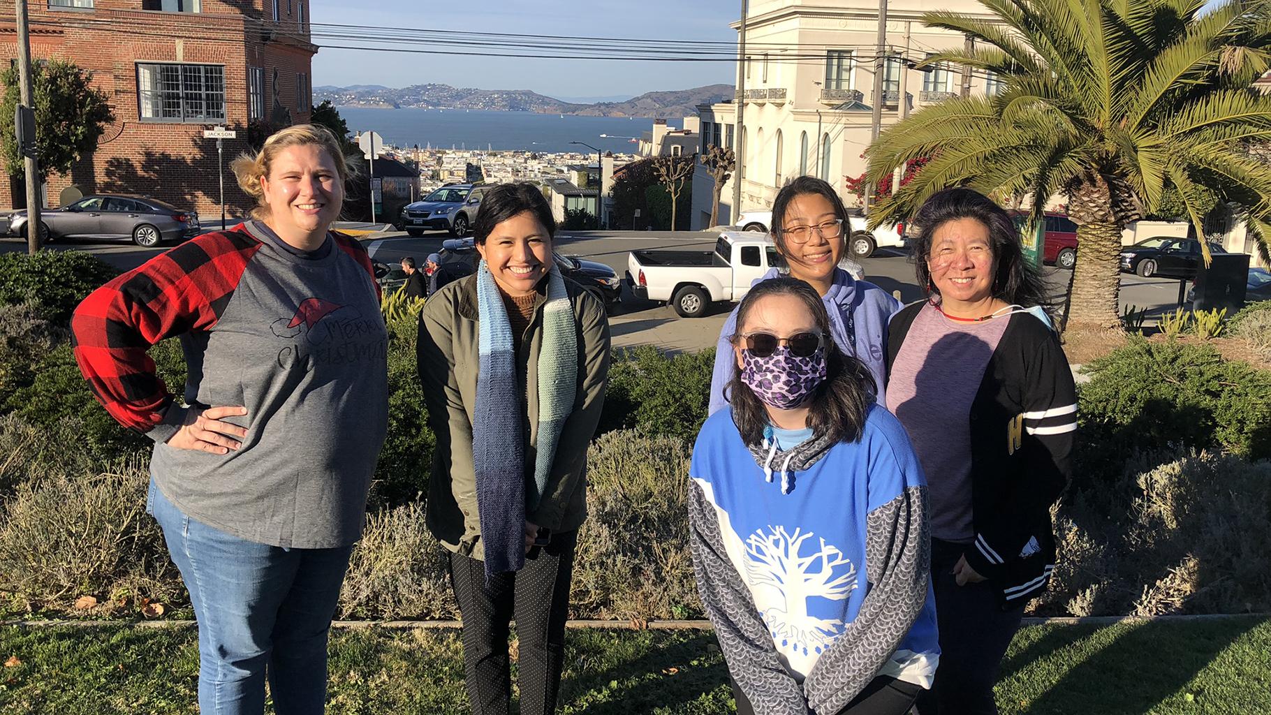 Five Step It Up participants pose in a park